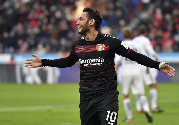 FILE - In this file photo dated Sunday, Jan. 22, 2017, Leverkusen&#039;s Hakan Calhanoglu celebrates after scoring from a penalty during the German Bundesliga soccer match between Bayer Leverkusen and ...