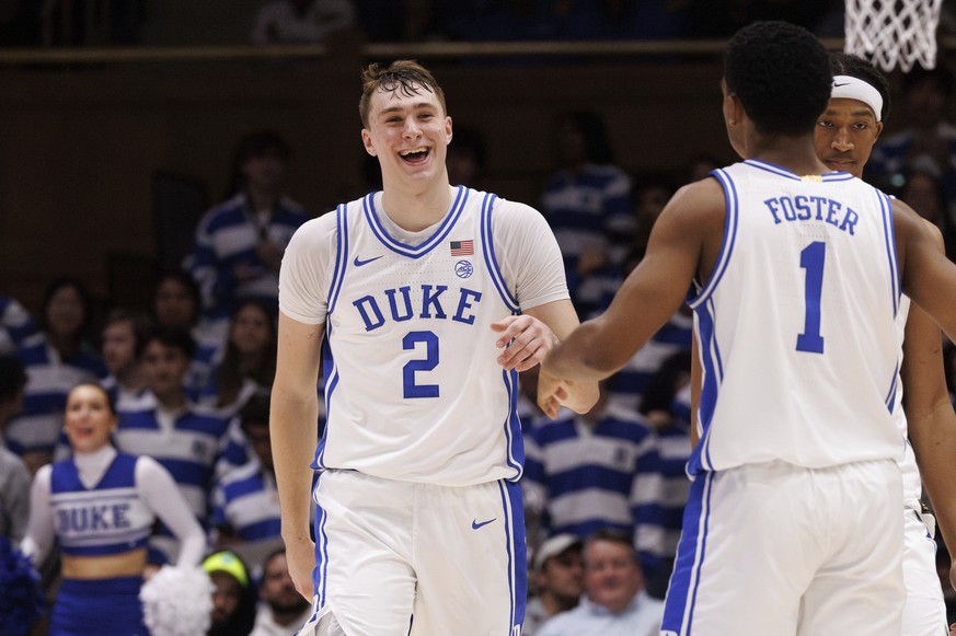 Duke&#039;s Cooper Flagg (2) smiles after dunking during the second half of an NCAA college basketball game against California in Durham, N.C., Wednesday, Feb. 12, 2025. (AP Photo/Ben McKeown)