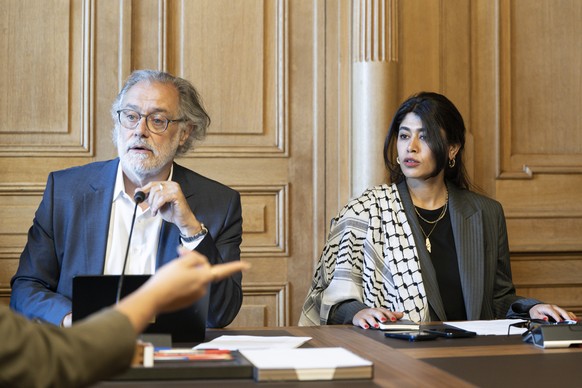 Rima Hassan, a French-Palestinian lawyer, activist, and politician, right, is visiting Council of States member Carlo Sommaruga (SP-GE), left, and other parliamentarians for a meeting at the Federal P ...