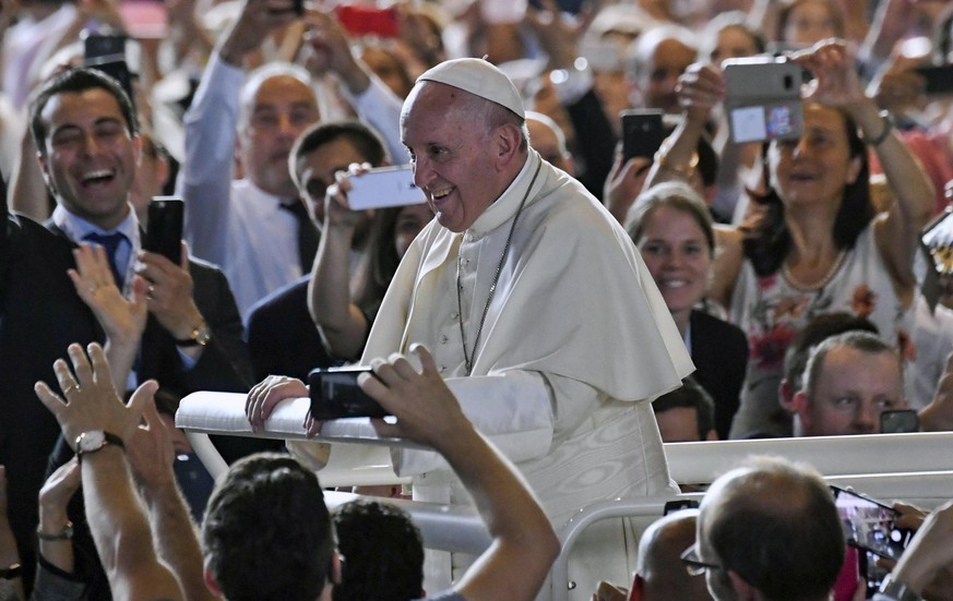 epa06828276 Pope Francis greets the audience before celebrating the Holy Mass at Palexpo hall in Geneva, Switzerland, 21 June 2018. Pope Francis visits the World Council of Churches as centerpiece of  ...