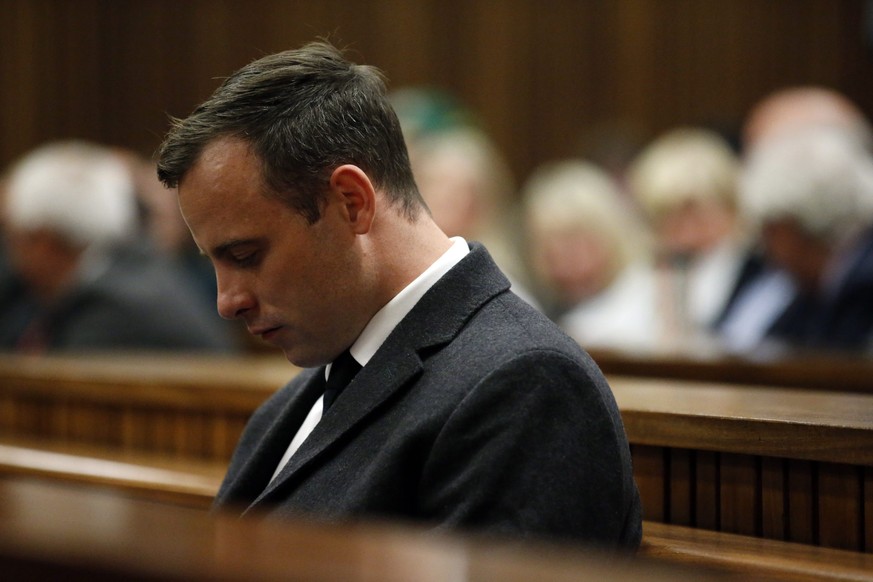 epa05410069 Paralympian athlete Oscar Pistorius, looks on during the hearing in his murder trial at the High Court in Pretoria, South Africa, 06 July 2016. Pistorius has been sentenced to six years in ...