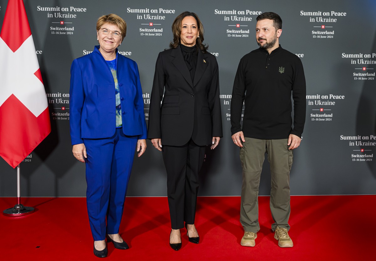 Swiss Federal President Viola Amherd (left) poses with Vice President Kamala Harris of United States (center) and President Volodymyr Zelenskyy of Ukraine (right) during the Summit on peace in Ukraine ...