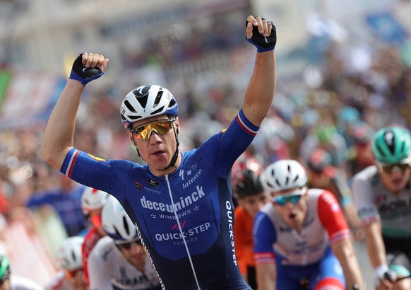 epa09423447 Dutch Fabio Jakobsen, of Deceuninck Quick Step team, celebrates after winning the 8th stage of the Spanish Cycling Vuelta, a 173,7 km-long race between Santa Pola (Alicante) and La Manga d ...