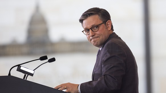 epa11234416 Republican Speaker of the House Mike Johnson speaks at a ceremony to honor WWII veterans from the 23rd Headquarters Special Troops and the 3133d Signal Services Company, known collectively ...