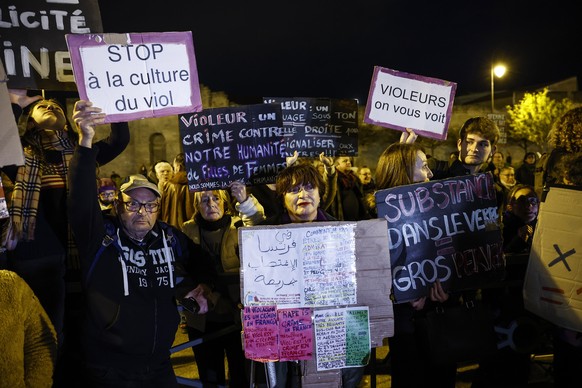 epa11740200 Activists demonstrate against sexual violence outside the criminal court in Avignon, France, 25 November 2024, where Dominique Pelicot stands trial. Pelicot is accused of drugging and rapi ...