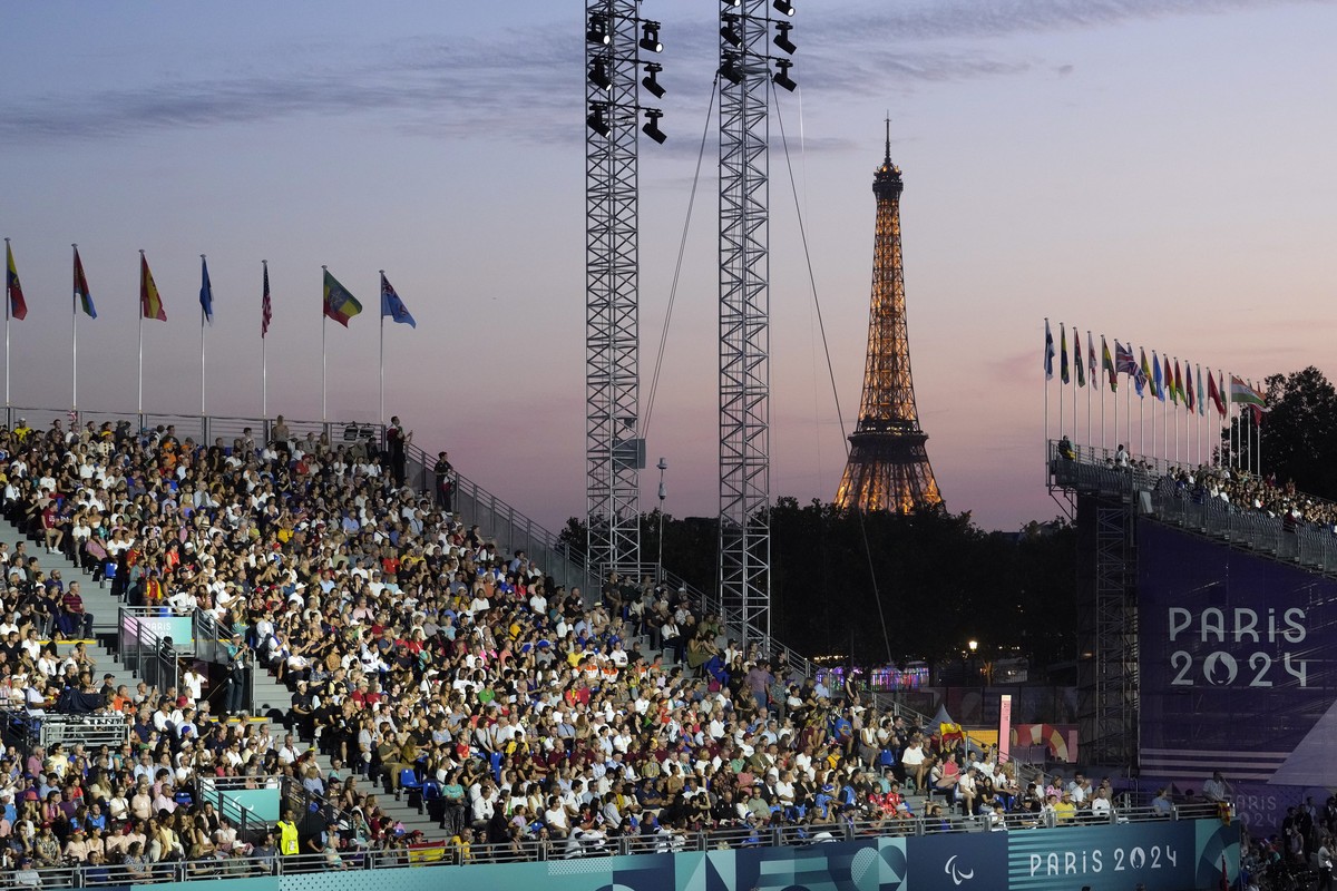 Spectators attend the Opening Ceremony for the 2024 Paralympics, Wednesday, Aug. 28, 2024, in Paris, France. (AP Photo/Michel Euler)