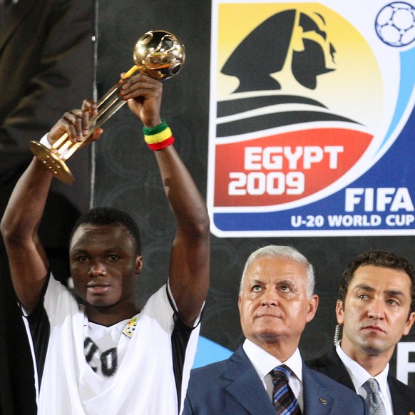 Ghana&#039;s Dominic Adiyiah raises the trophy of the MPV of the U-20 World Cup at the Cairo International Stadium, in Cairo, on Friday, Oct. 16, 2009. Ghana beat Brazil 4-3 in penalties after the mat ...