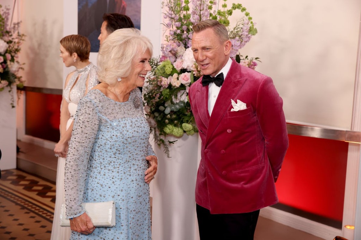 LONDON, ENGLAND - SEPTEMBER 28: Camilla, Duchess of Cornwall meets some of the cast including Daniel Craig at the World Premiere of "NO TIME TO DIE" at the Royal Albert Hall on September 28, ...