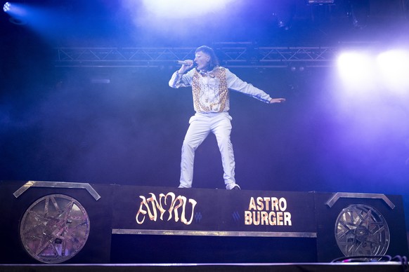 epa12241937 Swiss rapper Luc Julian Peyer also know as Jule X performs on the Waldbuehne Stage at the 42nd edition of the Gurtenfestival in Bern, Switzerland, 16 July 2025. The open air music festival ...