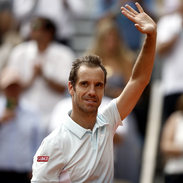 epa12143404 Richard Gasquet of France reacts during a farewell ceremony after losing his last match of his career in the Men&#039;s 2nd round match against Jannik Sinner of Italy at the French Open Gr ...