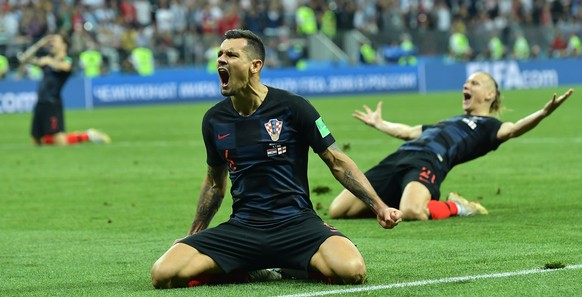 epa06882019 Dejan Lovren (C) of Croatia celebrates with teammates after winning the FIFA World Cup 2018 semi final soccer match between Croatia and England in Moscow, Russia, 11 July 2018.

(RESTRIC ...