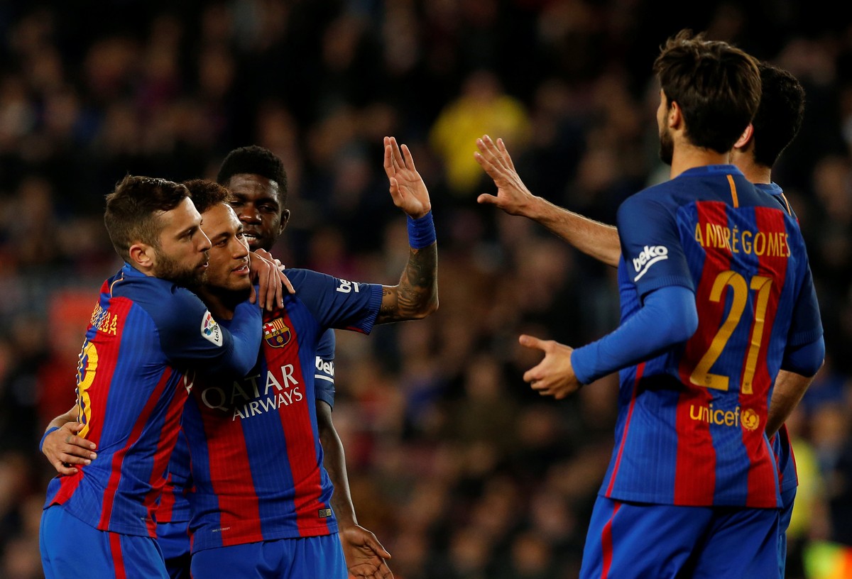 Football Soccer - Barcelona v Sporting Gijon - Spanish LaLiga Santander - Camp Nou stadium, Barcelona, Spain - 1/03/2017. Barcelona's players celebrate a goal. REUTERS/Albert Gea