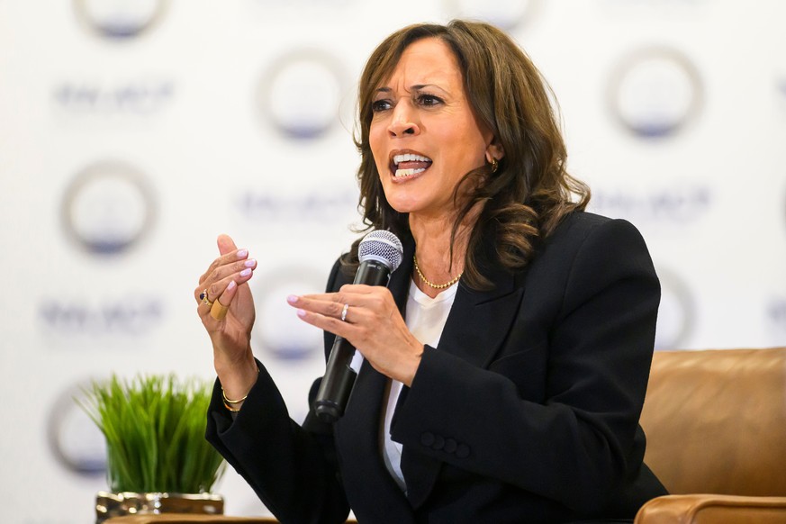 Former Vice President Kamala Harris speaks with the Rev. Wendell Anthony, President of the Detroit Branch of the NAACP, and the Rev. Genetta Y. Hatcher during a fireside chat on Tuesday, Sept. 22, 202 ...
