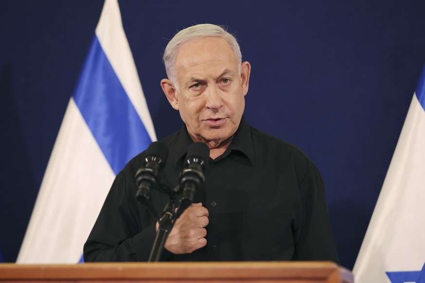 FILE - Israeli Prime Minister Benjamin Netanyahu speaks during a news conference in the Kirya military base in Tel Aviv, Israel, on Oct. 28, 2023. Israeli Prime Minister Benjamin Netanyahu told his Ca ...
