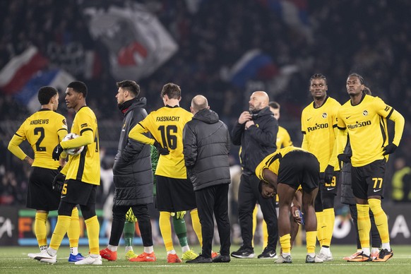 YB's players and staff show their disappointment after losing the Europa League soccer match opposing BSC Young Boys and France's Olympique Lyonnais, at the Wankdorf stadium in Bern, Switzer ...