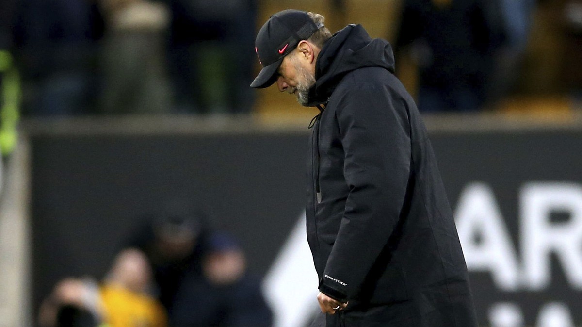 Liverpool manager Jurgen Klopp walks off the pitch, at the end of the English Premier League soccer match between Wolverhampton Wanderers and Liverpool, at Molineux Stadium, in Wolverhampton, England, ...