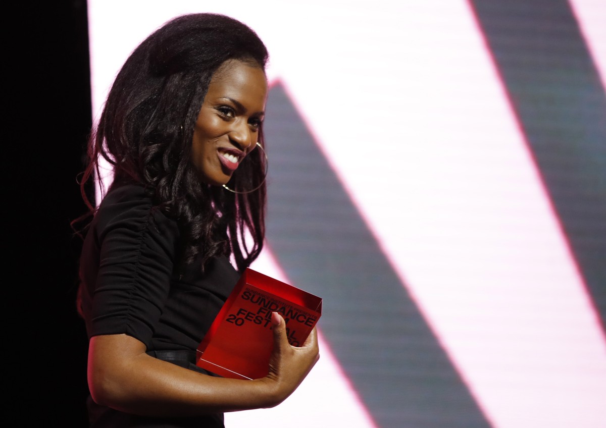 epa08186739 French director Maimouna Doucoure accepts the World Cinema Dramatic Directing Award for the movie 'Cuties' at the 2020 Sundance Film Festival awards night in Park City, Utah, USA ...