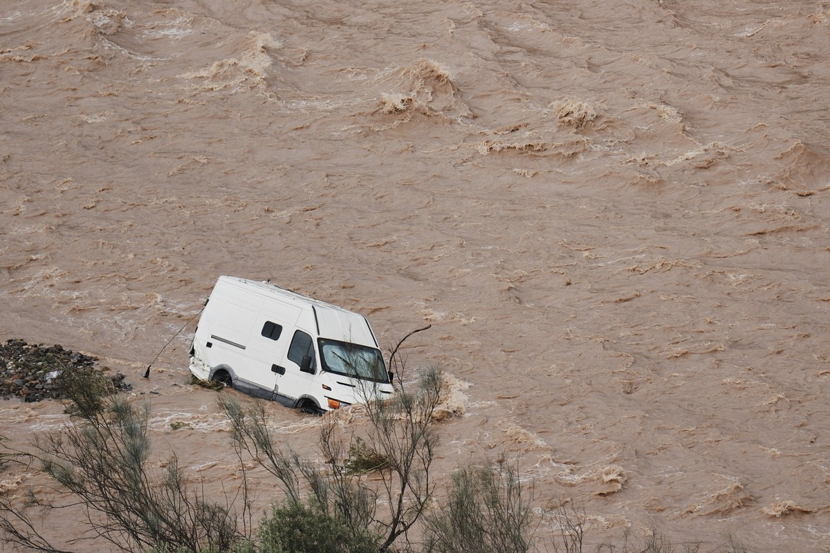 A van is photographed being swept away by the flood in Casasola, Malaga, Spain, Tuesday, March 18, 2025. (AP Photo/Gregorio Marrero)
Spain Floods