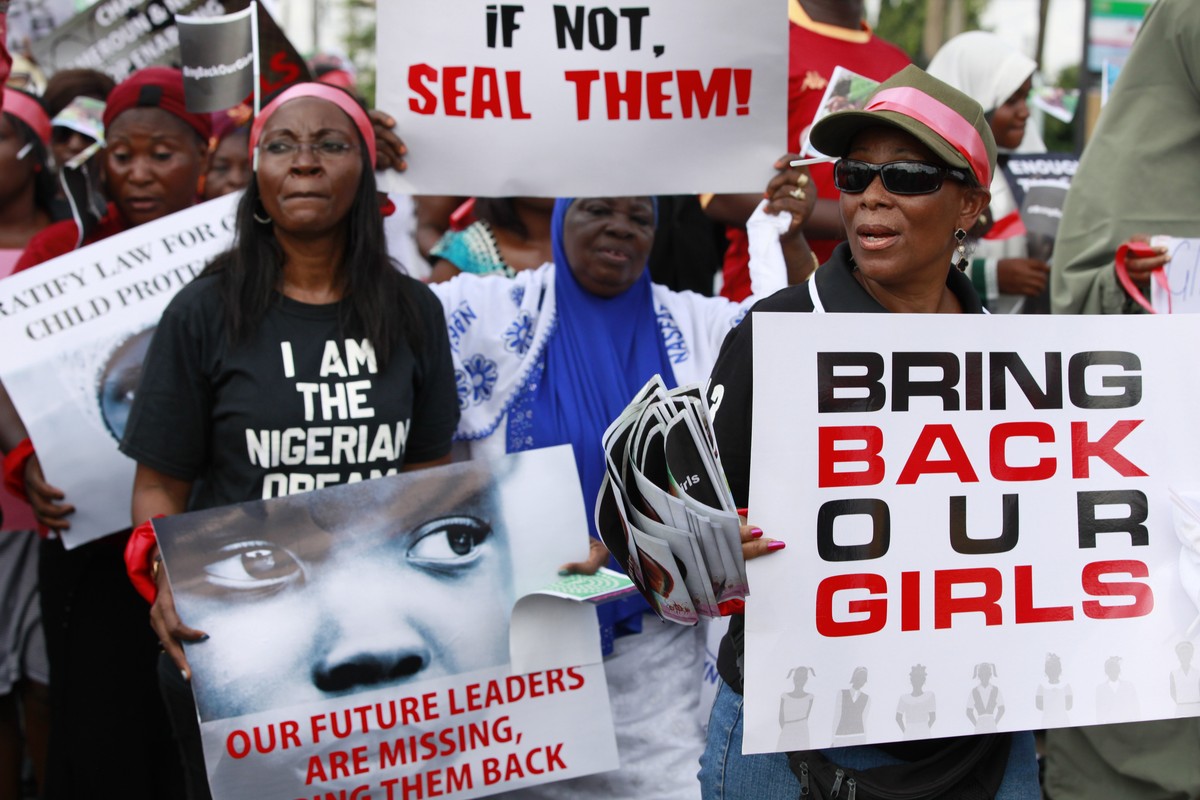 Women attend a demonstration calling on the government to rescue kidnapped school girls of a government secondary school Chibok, in Lagos, Nigeria, Monday May 5, 2014. Their plight — and the failure o ...