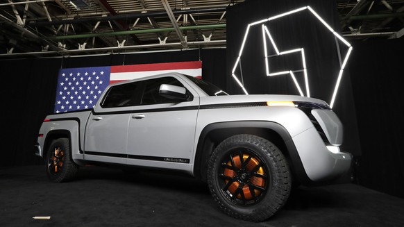 FILE - This Thursday, June 25, 2020, file photo shows the electric Endurance pick-up truck at Lordstown Motors Corporation, in Lordstown, Ohio. Global automakers are stepping up the pace when it comes ...