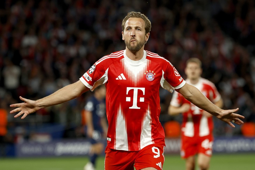 epa12920094 Harry Kane of Bayern celebrates after scoring the opening goal during the UEFA Champions League semi-final match between Paris Saint-Germain and Bayern Munich in Paris, France 28 April 202 ...