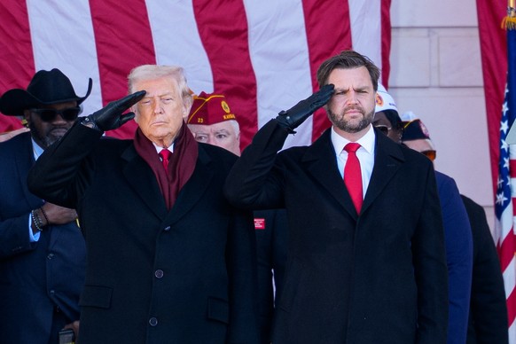 epa12519055 President Donald Trump (L) and Vice President JD Vance (R) salute as they attend a Veterans Day ceremony at Arlington Cemetery, Arlington, VA, USA, 11 November 2025. EPA/AARON SCHWARTZ