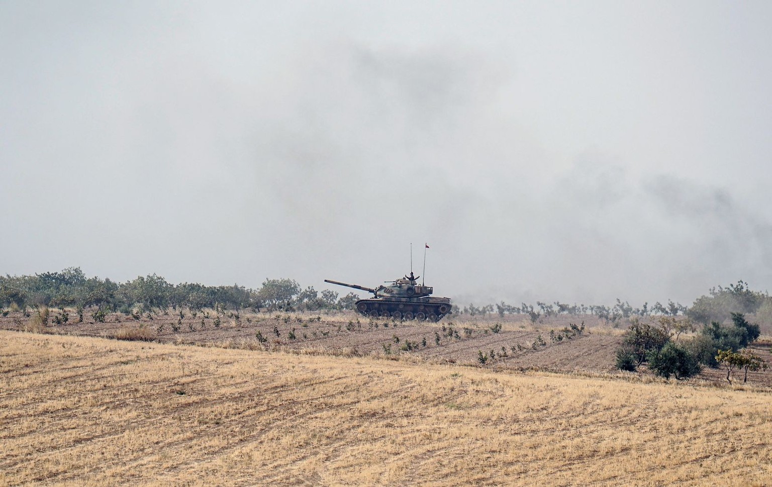 A Turkish army tank advances toward the Syrian border, in Karkamis, Turkey, Thursday, Aug. 25, 2016. Turkish President Recep Tayyip Erdogan late Wednesday said that Syrian opposition forces aided by A ...
