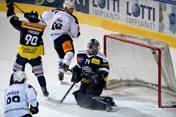 Zug&#039;s player Raphael Diaz center make the 1 - 1 goal, during the preliminary round game of National League Swiss Championship 2018/19 between HC Ambri Piotta and EV Zug, at the ice stadium Valasc ...