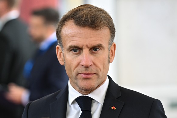 epa12419886 French President Emmanuel Macron speaks to media as she arrives at Christiansborg Castle in Copenhagen, Denmark, 01 October 2025, for an informal meeting of EU heads of state and governmen ...