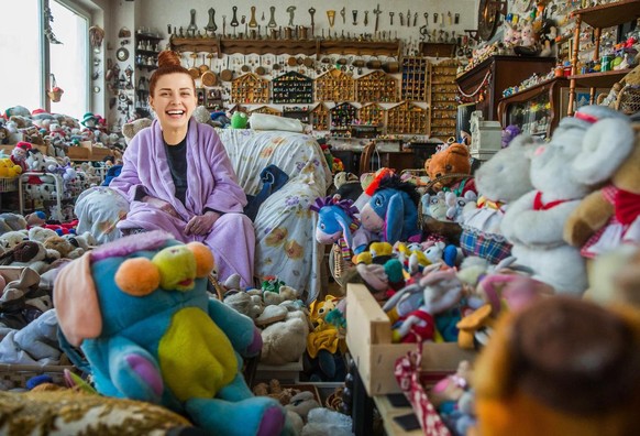epa05849761 Catherine Bloemen, 86 years old, is surrounded by her collection of Kinder Surprise toys and Teddy Bear in Brussels, Belgium, 15 March 2017. Catherine Bloemen has been collecting Kinder Su ...
