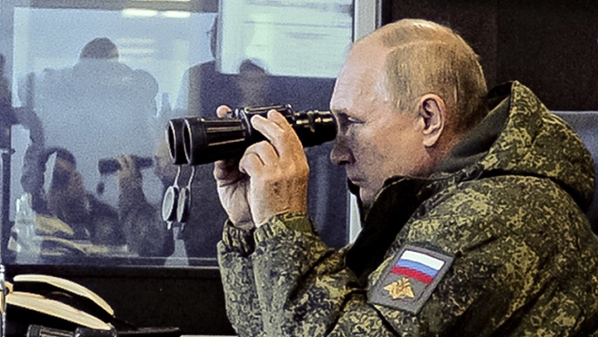 FILE - Russian President Vladimir Putin watches the Vostok 2022 (East 2022) military exercise in far eastern Russia, outside Vladivostok, on Sept. 6, 2022. Putin&#039;s threats to use &quot;all the me ...