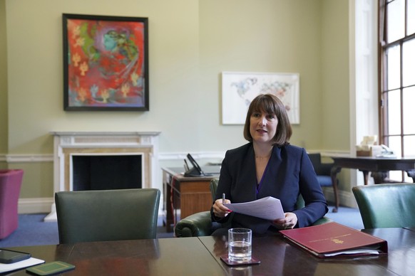 FILE - Britain&#039;s Chancellor Rachel Reeves prepares to deliver a speech at the Treasury to an audience of leading business figures and senior stakeholders, announcing the first steps the new gover ...