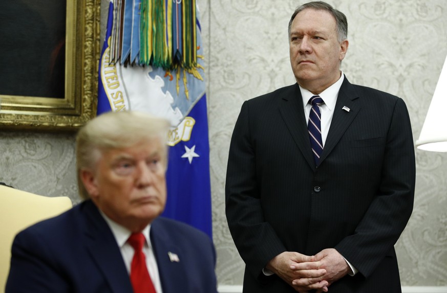 Secretary of State Mike Pompeo listens as President Donald Trump and Turkish President Recep Tayyip Erdogan meet in the Oval Office with Republican senators at the White House Wednesday, Nov. 13, 2019 ...
