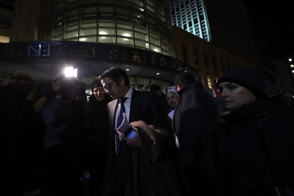 epa05758149 American Civil Liberties Union (ACLU) Lawyer Omar C. Jadwat (C) speaks outside of the US District Court in New York, where a judge issued an emergency stay for those detained at airports,  ...