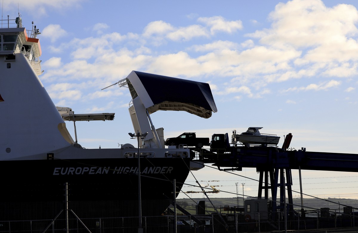 Vehicles board a P&amp;O ferry bound for Scotland, at the port in Larne on the north coast of Northern Ireland, Friday, Jan. 1, 2021. This New Year's Day is the first day after Britain's Bre ...