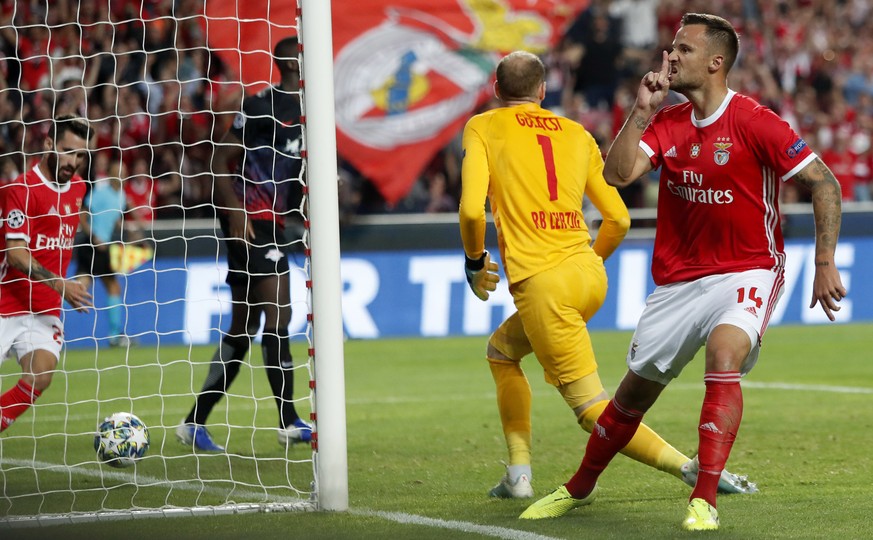 Benfica&#039;s Haris Seferovic reacts after scoring his side&#039;s first goal during the Champions League group G soccer match between Benfica and Leipzig at the Luz stadium in Lisbon, Tuesday, Sept. ...