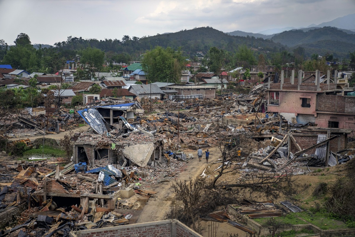 Dozens of houses lay vandalised and burnt during ethnic clashes and rioting in Sugnu, in the northeastern Indian state of Manipur, Wednesday, June 21, 2023. (AP Photo/Altaf Qadri)