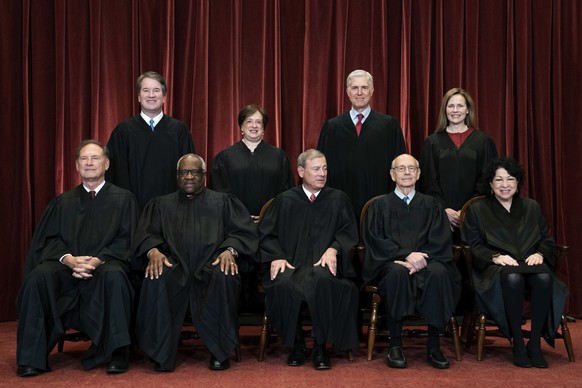 FILE - In this April 23, 2021, file photo, members of the Supreme Court pose for a group photo at the Supreme Court in Washington. Seated from left are Associate Justice Samuel Alito, Associate Justic ...