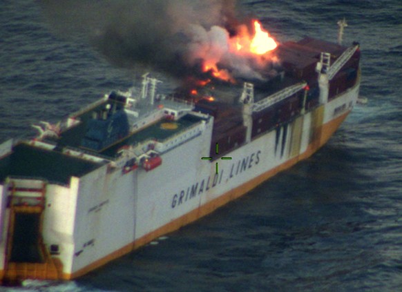 This photo provided on Thursday March 14, 2019 by the Marine Nationale, shows the Grimaldi vessel Grande America on fire in the Bay of Biscay, off the west coast of France, Monday March 11, 2019. Fren ...