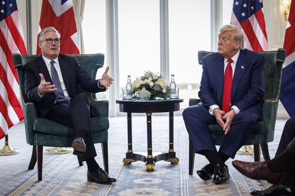 epa12269108 British Prime Minister Keir Starmer (L) and US President Donald J. Trump meet and speak to the media at the Trump Turnberry golf resort in Turnberry, Scotland, Britain, 28 July 2025. Presi ...