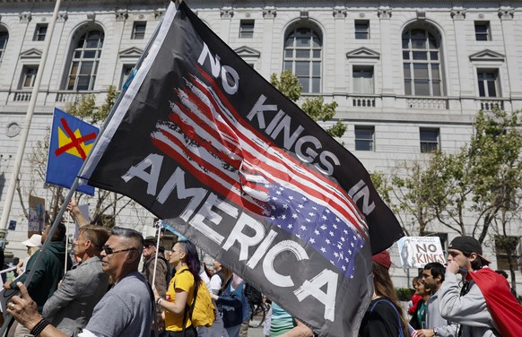epa12857958 Protesters participate in the nationwide 'No Kings' march and rally in San Francisco, California, USA, 28 March 2026. The event is one of more than 3,100 demonstrations held acro ...