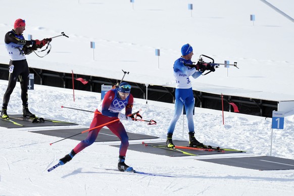 Vetle Sjaastad Christiansen of Norway leaves the shooting range during the men&#039;s 4x7.5-kilometer relay at the 2022 Winter Olympics, Tuesday, Feb. 15, 2022, in Zhangjiakou, China. (AP Photo/Frank  ...