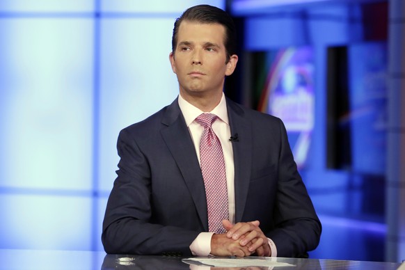 FILE - In this July 11, 2017, file photo, Donald Trump Jr. is interviewed by host Sean Hannity on the Fox News Channel television program, in New York. The Republican National Committee has spent near ...