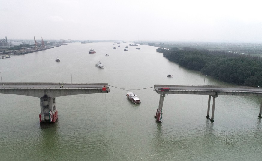 epa11171515 An aerial view taken with a drone shows the fractured Lixinsha Bridge in Nansha District of Guangzhou, south China&#039;s Guangdong Province, 22 February 2024. Two people were killed and t ...