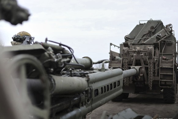 In this photo distributed by Russian Defense Ministry Press Service on Saturday, March 15, 2025, a destroyed Ukrainian Army M777 howitzer, left, is transported at Cherkasskoe Porechnoe and Pravda in S ...