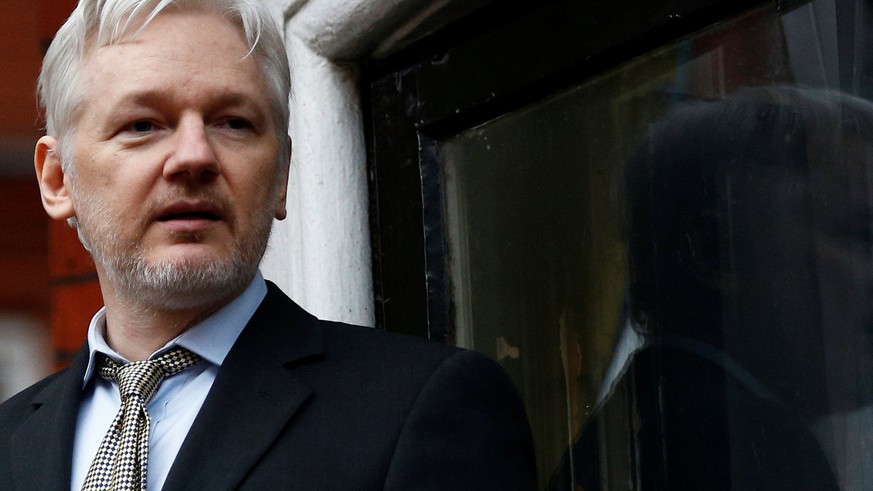 WikiLeaks founder Julian Assange makes a speech from the balcony of the Ecuadorian Embassy, in central London, Britain February 5, 2016. REUTERS/Peter Nicholls/File Photo