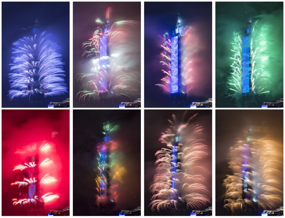 epa07255522 An eightfold combo picture shows fireworks and light effects illuminating the night sky from the Taipei 101 skyscraper during New Year&#039;s Eve celebrations in Taipei, Taiwan, 01 January ...