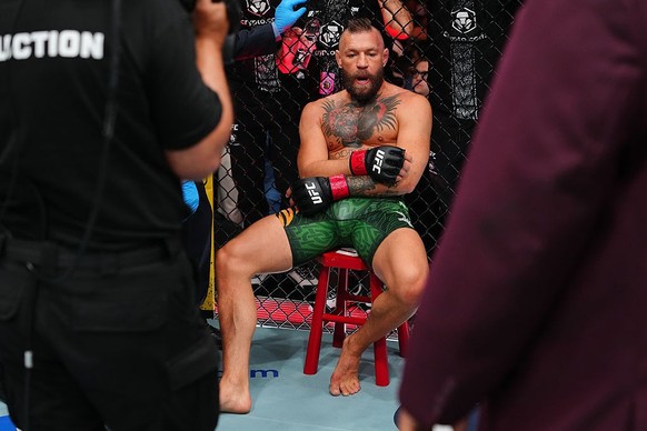LAS VEGAS, NEVADA - JULY 11: Conor McGregor of Ireland reacts to the injury stoppage in a welterweight fight during the UFC 329 event at T-Mobile Arena on July 11, 2026 in Las Vegas, Nevada. (Photo by ...