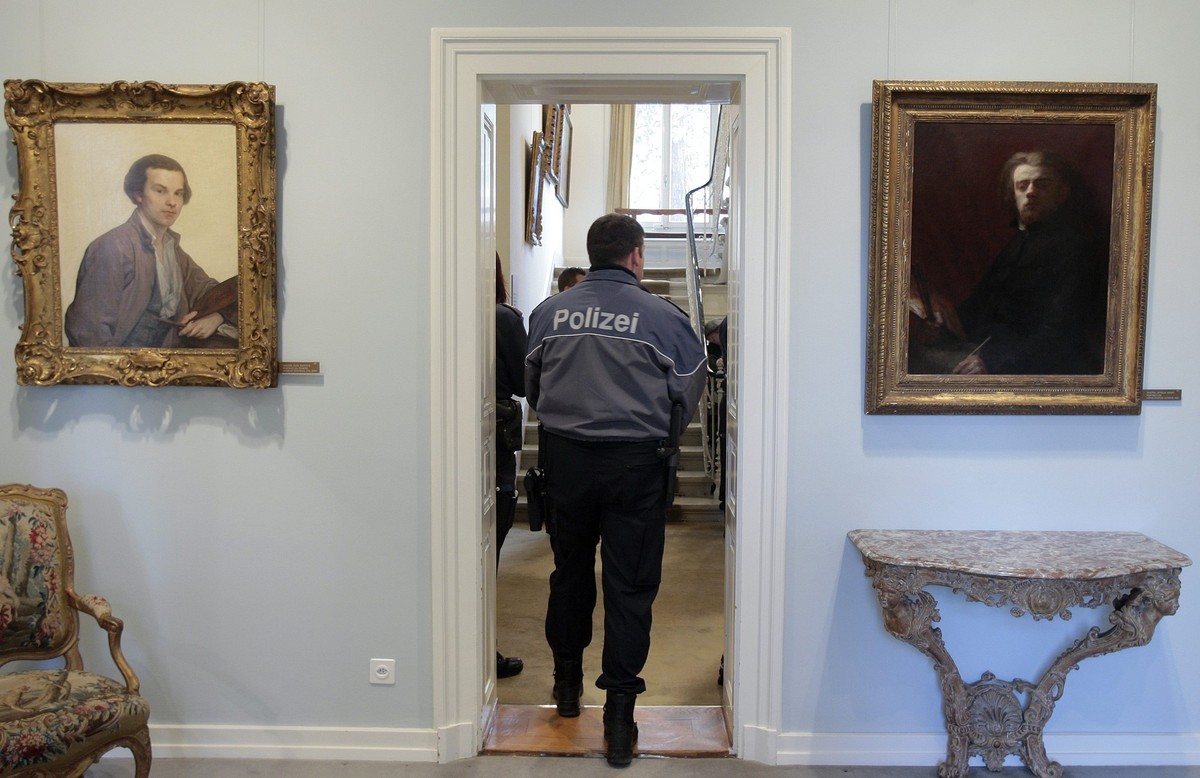 A police officer is seen in the E.G. Buehrle collection, during a media tour of the museum, Tuesday, February 12, 2008 in Zurich, Switzerland. Four paintings, worth 180 million Swiss Francs, from the  ...