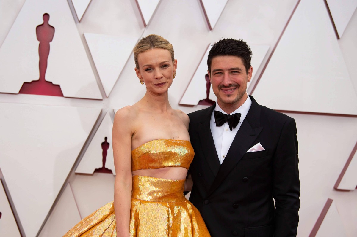OscarÂ® nominee Carey Mulligan and Marcus Mumford arrive on the red carpet of The 93rd OscarsÂ® at Union Station in Los Angeles, CA on Sunday, April 25, 2021.